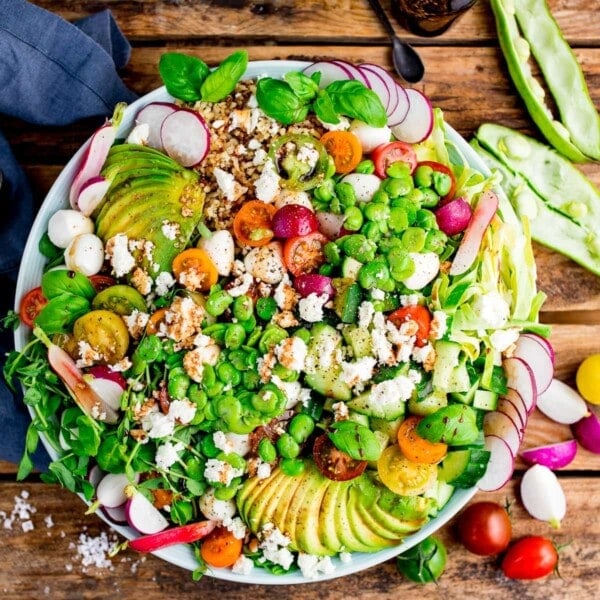 broadbean and quinoa caprese salad in a large bowl